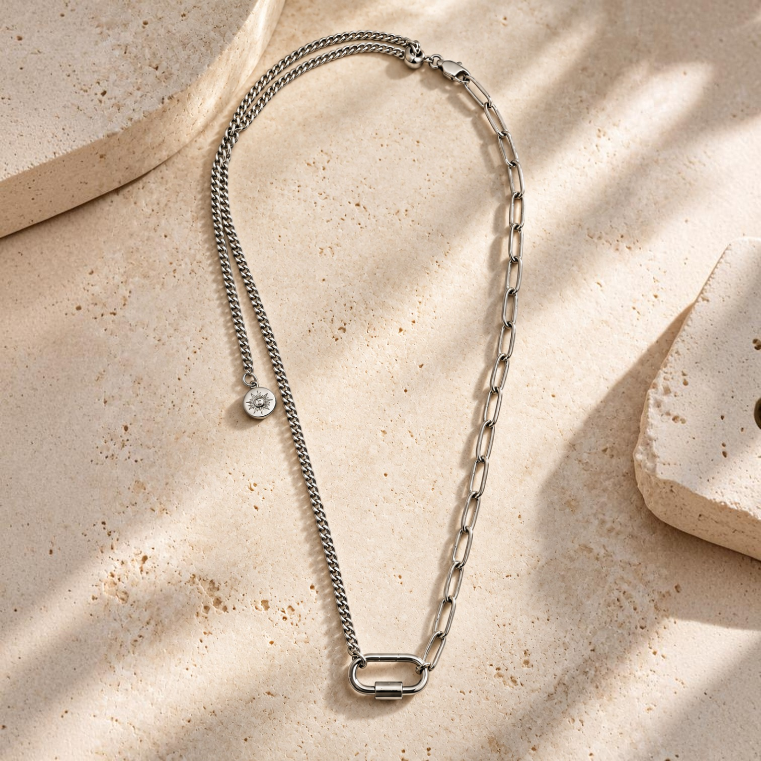 HOUSE OF EVEN silver-tone stainless steel mixed-chain necklace with a front connector and small sun charm.